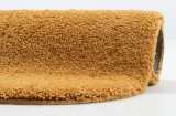 Koupelnový koberec TOM TAILOR COZY BATH zlatý